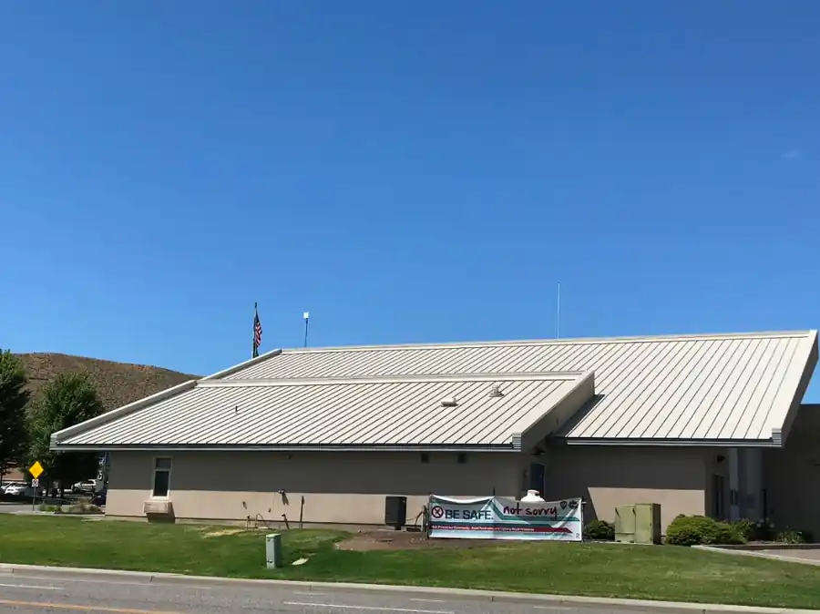 Tan standing-seam public building